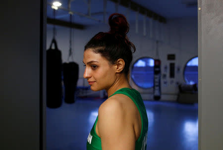 Iranian boxer Sadaf Khadem looks on before the fight against French boxer Anne Chauvin during an official boxing bout in Royan, France, April 13, 2019. REUTERS/Stephane Mahe