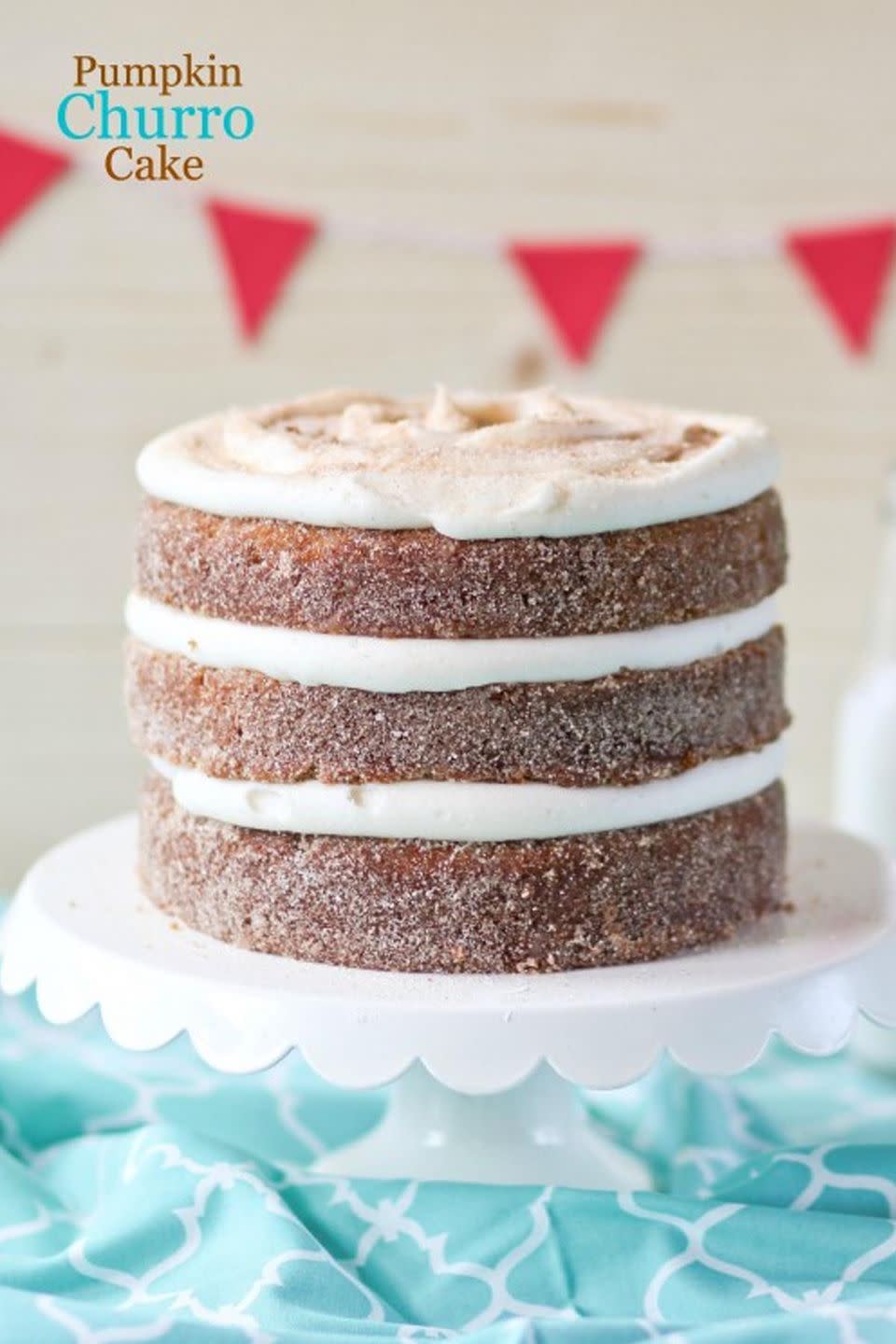 <p>Three thick layers of pumpkin cake are coated in cinnamon sugar to create a churro-like dessert. Sandwiched between cream cheese frosting, it's even better than the original.</p><p><strong><em>Get the recipe at <a href="http://www.confessionsofacookbookqueen.com/pumpkin-churro-layer-cake/" rel="nofollow noopener" target="_blank" data-ylk="slk:Confessions of a Cookbook Queen;elm:context_link;itc:0;sec:content-canvas" class="link ">Confessions of a Cookbook Queen</a>.</em></strong></p>