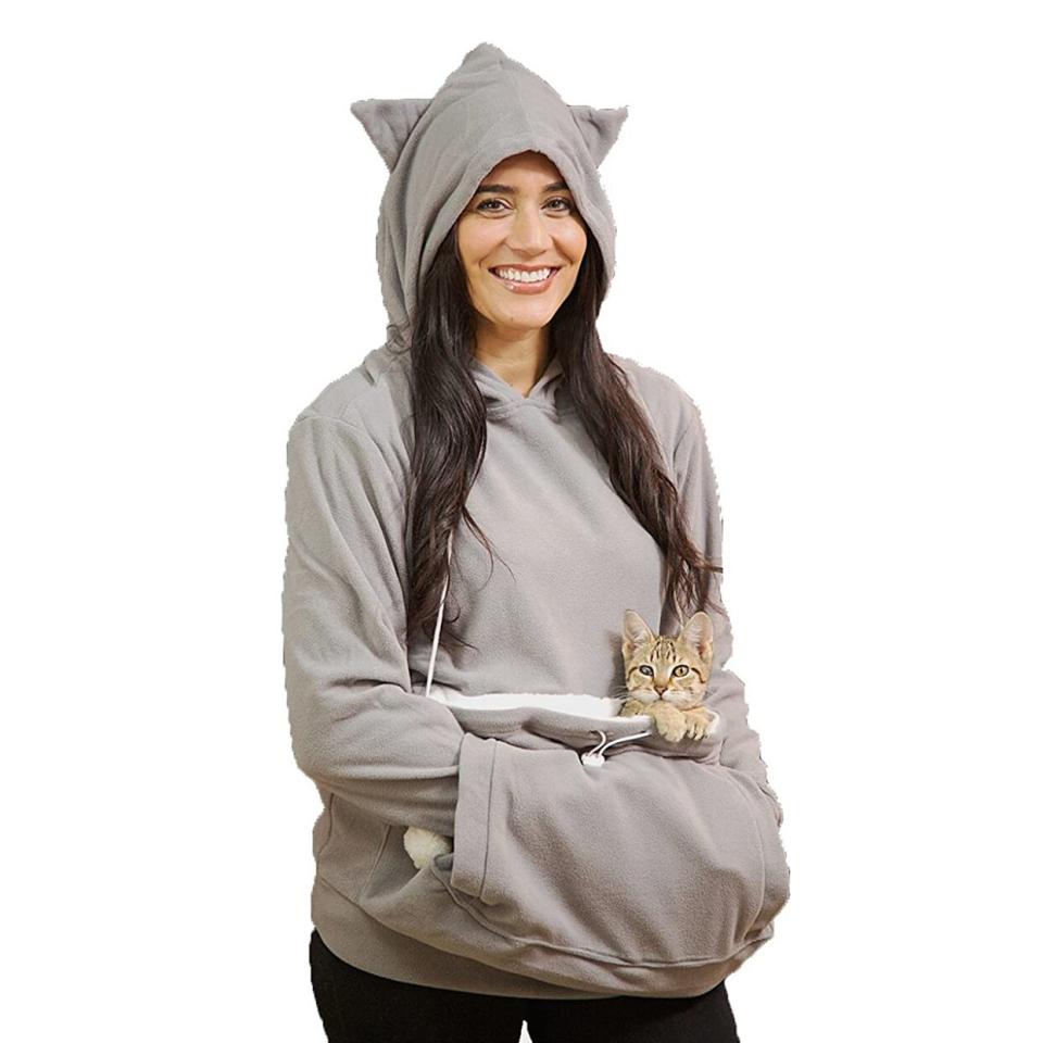 Model wearing a KittyRoo Hoodie on a white background