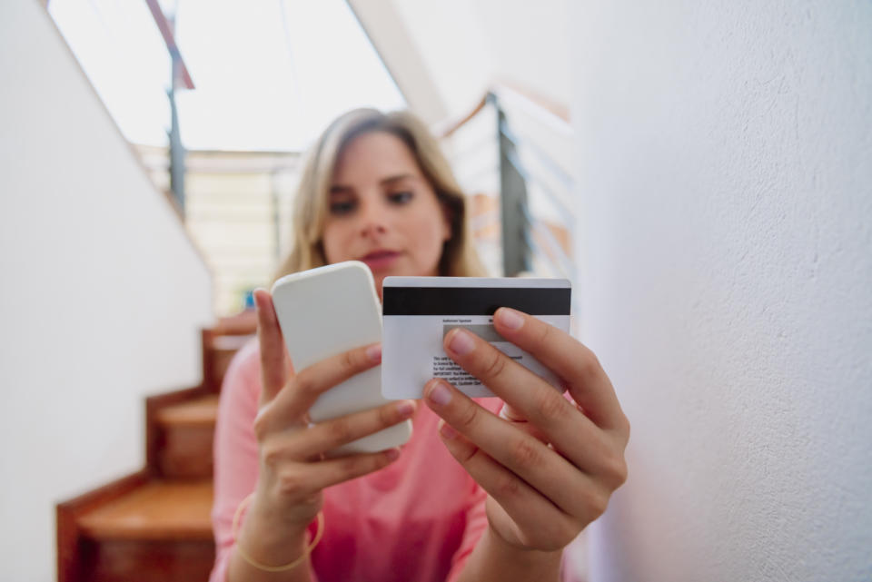 Opt-out of overdraft protection so the next time you swipe your debit card and there isn’t enough money to cover the purchase, your card will get declined instead of overdrafting your account. (Photo: Getty)