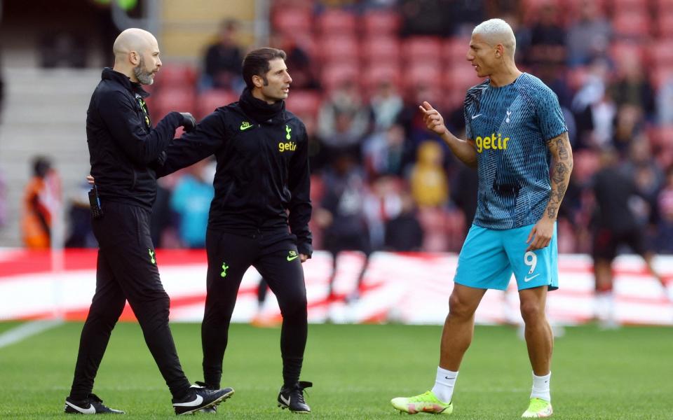 Tottenham Hotspur's Richarlison talks to medical staff during the warm up - Reuters/Paul Childs