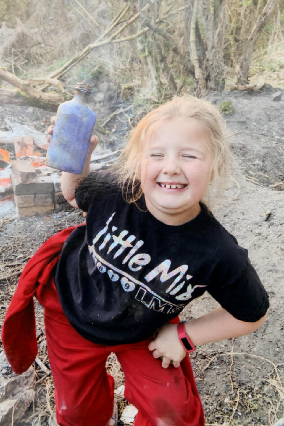 A seven-year-old schoolgirl is raking in hundreds of pounds by selling antique bottles from a little shop in her back garden - after digging them up from old landfill sites. Betsy-Mae Lloyd has been coining it in after launching her own business at her parents' home while still attending primary school. The young entrepreneur flogs old bottles, jars and teapots - dating back to between the 1870s and 1930 - which she finds on historic landfill sites in the West Midlands. After taking them home and cleaning them up herself, she then stores them in a Victorian-style play shed, built by dad Jason, before listing them for sale on Facebook. 