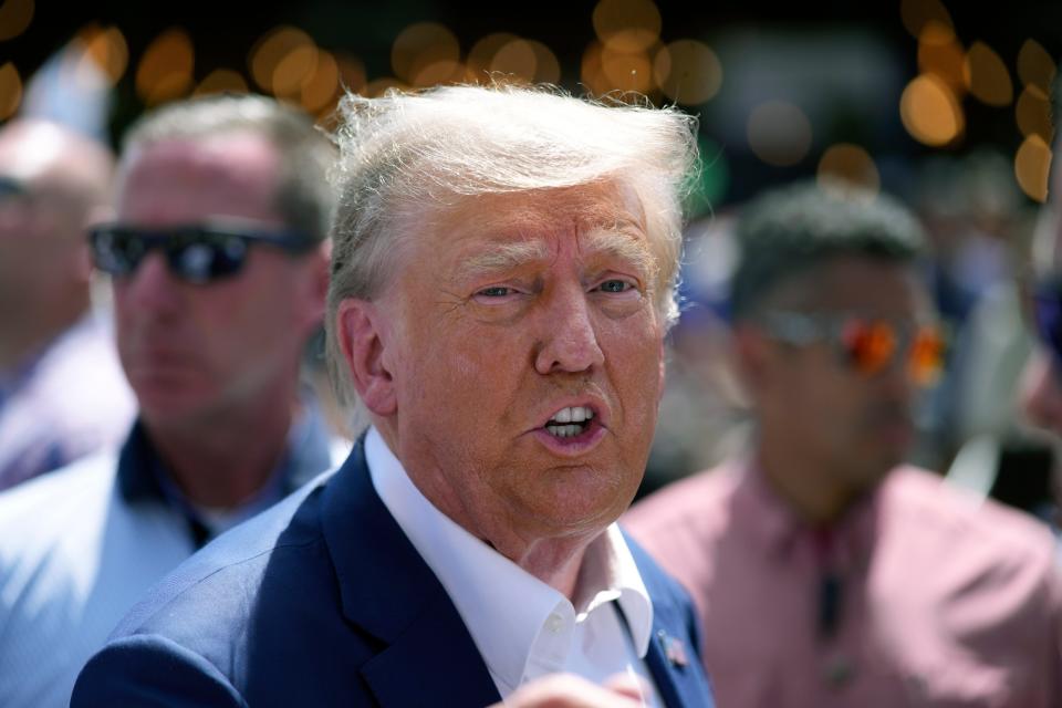 Republican presidential candidate former President Donald Trump visits the Iowa State Fair, Saturday, Aug. 12, 2023, in Des Moines, Iowa. (AP Photo/Charlie Neibergall)