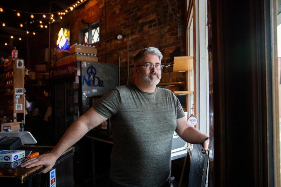 Joe Kuhlmann, founder and co-owner of The Evening Muse, stands inside his music venue in the NoDa neighborhood in August 2020.