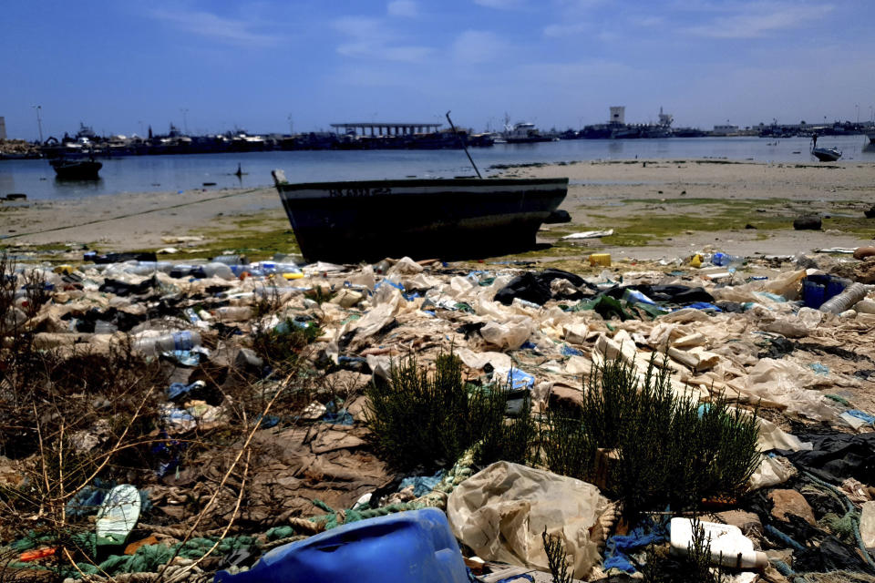 The shore of the Tunisian coastal town of Zarzis is pictured, Saturday June 12, 2021. Zarzis is a port city where migrants bound for Europe frequently wind up after their boats go astray in the Mediterranean's uncertain currents. One of its cemeteries is already filled with those who died trying to make the crossing. (AP Photo/Mehdi El Arem)