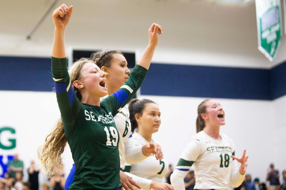 Seacrest Country Day School's Alexa Haley (19) celebrates after a play during the First Baptist Academy and Seacrest Country Day School volleyball semifinal on Tuesday, Nov. 2, 2021 at Seacrest Country Day School in Naples, Fla. 
