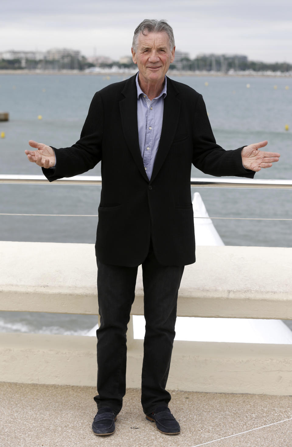 English comedian, actor, writer and television presenter Michael Palin poses during a photocall at the MIPCOM 2015 (International Film and Programme Market for Tv, Video,Cable and Satellite) in Cannes, southeastern France, Tuesday, Oct. 6, 2015. He presents the series ‘Clangers’. (AP Photo/Lionel Cironneau )