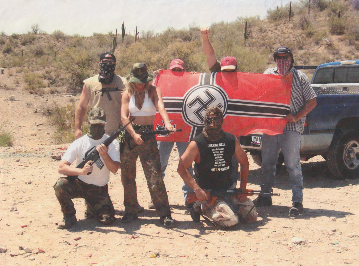 Williams with government agents posing as white supremacists in a desert photo shoot. - Credit: Courtesy of Rebecca Williams