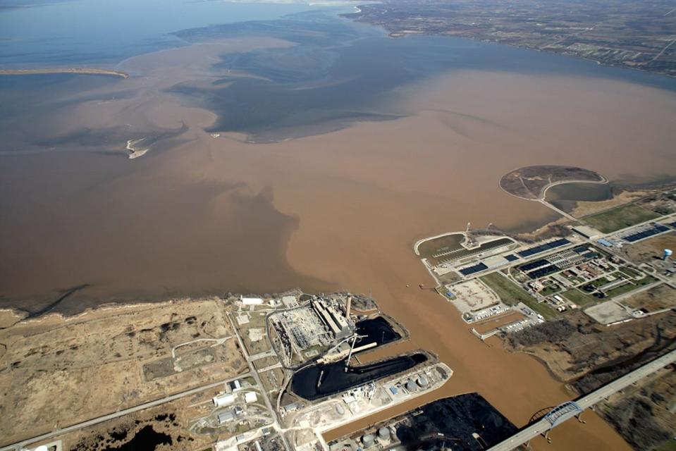 Sediment, nutrients, and pollutants from the Fox River flowing into the bay of Green Bay in 2012.