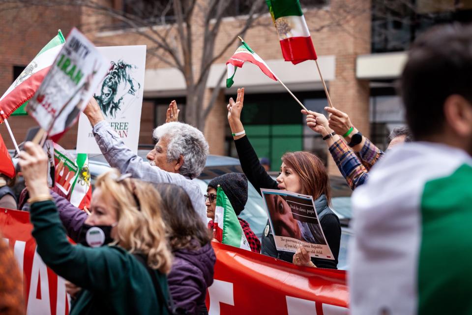 People chant slogans during a protest at the Interests Section of the Islamic Republic of Iran against the poisonings of school girls in Iran. The attacks have taken place over the last few months, sending hundreds of girls to the hospital in at least ten cities. Protest against poisonings of girls in Iran, Washington, United States - 02 Mar 2023