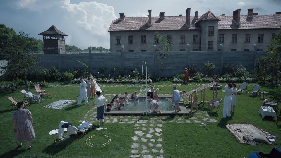 Only a stone wall separates the Höss residence from the Auschwitz death camp in "The Zone of Interest."