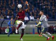 Football Soccer - AS Roma v Real Madrid - UEFA Champions League Round of 16 First Leg - Olympic stadium, Rome, Italy - 17/2/16 AS Roma's Antonio Rudiger (L) in action with Real Madrid Sergio Ramos . REUTERS/Tony Gentile