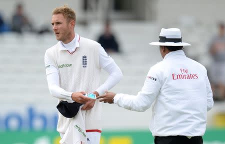 Cricket - England v New Zealand - Investec Test Series Second Test - Headingley - 1/6/15 England's Stuart Broad hands sunglasses to umpire Action Images via Reuters / Philip Brown Livepic