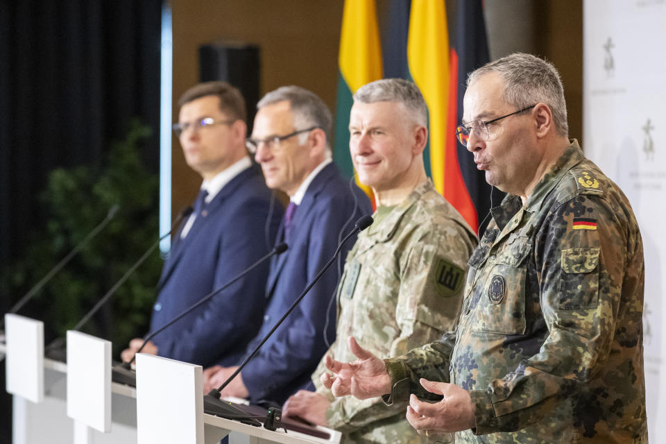 German Army Chief Lt. Gen. Alfons Mais, right, speaks during a media joint conference with Lithuanian Chief of Defence Gen. Valdemaras Rupsys and Lithuanian Defense Minister Laurynas Kasciunas as members of the Headquarters initial command element of the Bundeswehr's 45th Brigade Lithuania arrival by plane at a airport in Vilnius, Lithuania, Monday, April 8, 2024. Germany has made a commitment to deploy a heavy brigade with three maneuver battalions and all necessary enablers, including combat support and provision units, to Lithuania. In total, approx. 5 thousand German military and civilian personnel are expected to move to Lithuania with families in stationing the Brigade. (AP Photo/Mindaugas Kulbis)