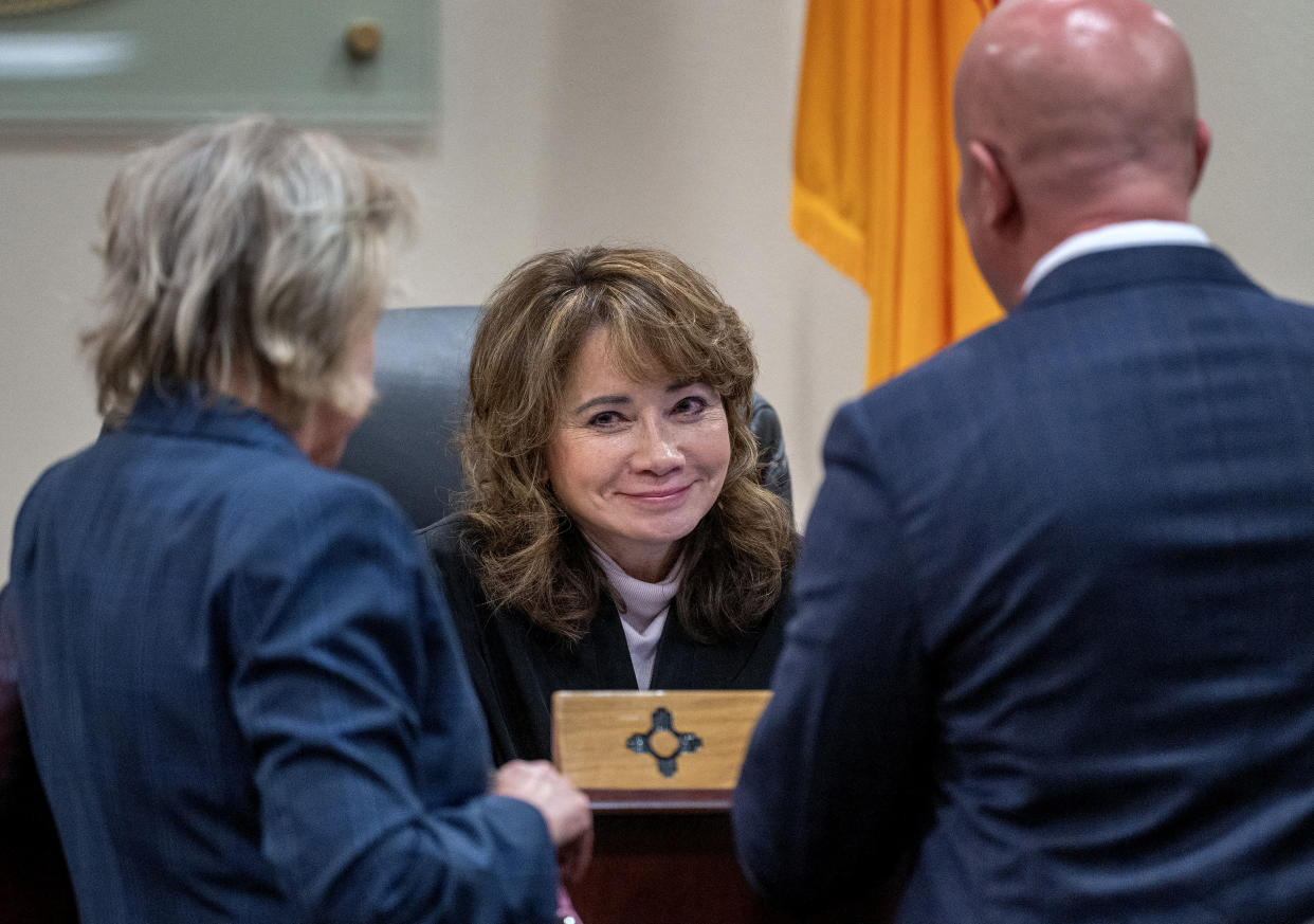 Judge Mary Marlowe Sommer speaks with prosecutor Kari Morrissey, left, and defense attorney Jason Bowles.