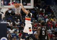 Mar 24, 2019; New Orleans, LA, USA; New Orleans Pelicans forward Anthony Davis (23) dunks against the Houston Rockets during the first half at the Smoothie King Center. Mandatory Credit: Derick E. Hingle-USA TODAY Sports