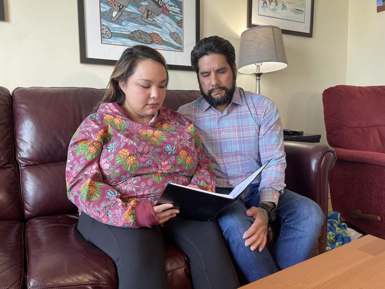 Jaffar Gebara, right, and Nicole Etitiq, left, are upset over Gebara's daughter being misdiagnosed with tuberculosis and treated without their knowledge. (TJ Dhir/CBC - image credit)