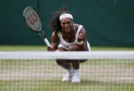 Serena Williams of the U.S.A. reacts during her match against Heather Watson of Britain at the Wimbledon Tennis Championships in London, July 3, 2015. REUTERS/Stefan Wermuth