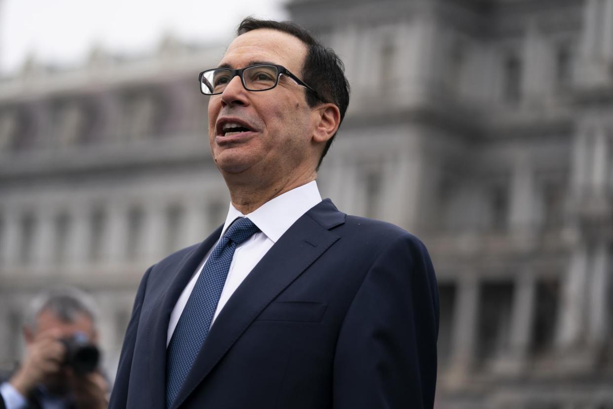 Treasury Secretary Steven Mnuchin talks to reporters about the economic impact of the coronavirus, at the White House, on 13 March, 2020: AP Photo/Evan Vucci