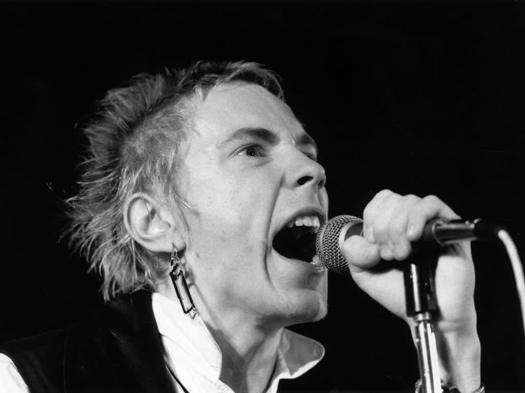 Johnny Rotten performs on stage in December 1976 (Graham Wood/Evening Standard/Getty Images)