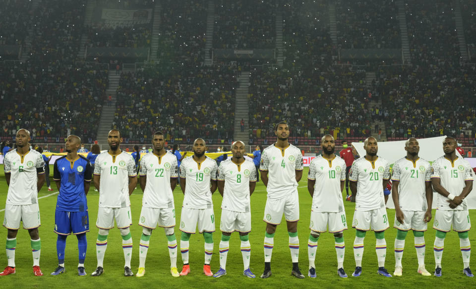 Comoros players before the start of their African Cup of Nations 2022 round of 16 soccer match against Cameroon at the Olembe stadium in Yaounde, Cameroon, Monday, Jan. 24, 2022. (AP Photo/Themba Hadebe)