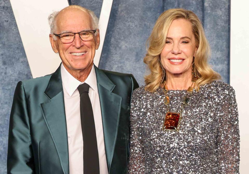 <p>Amy Sussman/Getty</p> Jimmy Buffett and Jane Slagsvol attend the 2023 Vanity Fair Oscar Party 