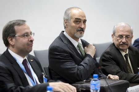 Syrian ambassador to the United Nations and head of the government delegation Bashar al-Jaafari (C) attends a meeting during Syria peace talks at the United Nations in Geneva, Switzerland, April 15, 2016. REUTERS/Fabrice Coffrini/Pool