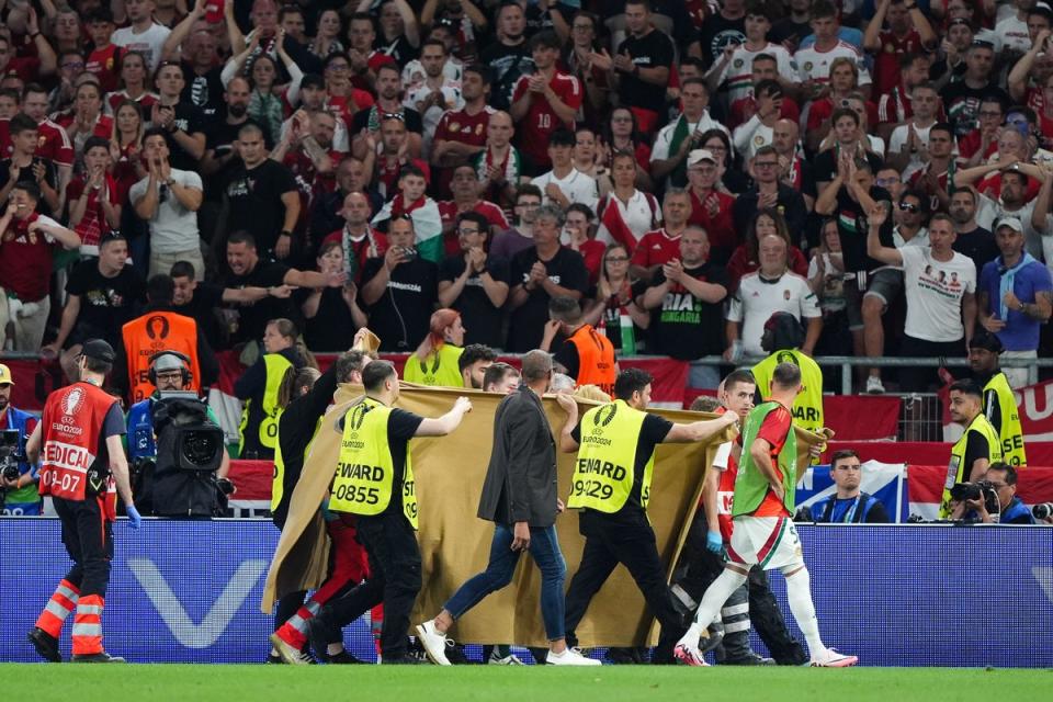 Hungary’s Barnabas Varga is taken from the pitch on a stretcher (Bradley Collyer/PA) (PA Wire)