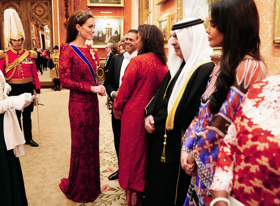 LONDON, ENGLAND - DECEMBER 06: Catherine, Princess of Wales (centre left) during a Diplomatic Corps reception at Buckingham Palace on December 6, 2022 in London, England. The last Reception for the Diplomatic Corps was hosted by Queen Elizabeth II at Buckingham Palace in December 2019.  (Photo by Victoria Jones - Pool/Getty Images)