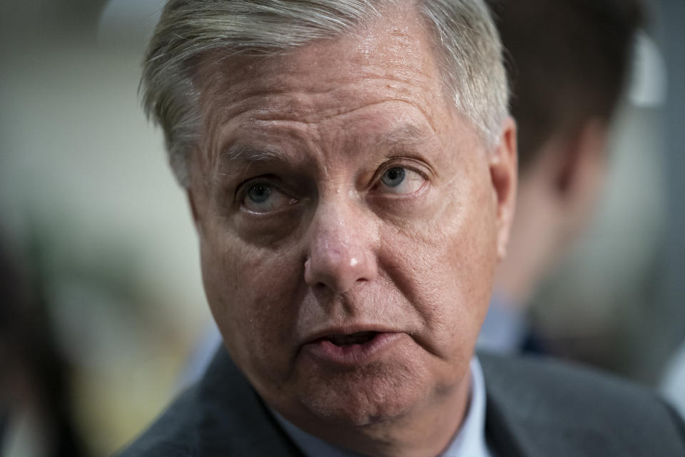 FILE - In this Sept. 25, 2019, file photo, Senate Judiciary Committee Chairman Lindsey Graham, R-S.C., takes questions from reporters at the Capitol in Washington. Congressional Republicans have spent most of the past two years studiously avoiding any public fights with President Donald Trump, either out of party loyalty or fear of being on the wrong end of a presidential tweetstorm. That public show of unity ended emphatically when Trump announced he would be withdrawing U.S. forces from northern Syria in advance of an impending Turkish military operation against Syrian Kurdish militia fighters. Graham, Mitch McConnell of Kentucky and Ted Cruz of Texas all joined Democratic colleagues in publicly criticizing the idea, with Graham even going on Fox News to label the decision “short-sighted and irresponsible.” (AP Photo/J. Scott Applewhite, File)