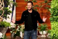 <p>Country star Luke Bryan plays to the crowd during his appearance on <em>The Ellen DeGeneres Show</em> on Monday in Burbank, California.</p>