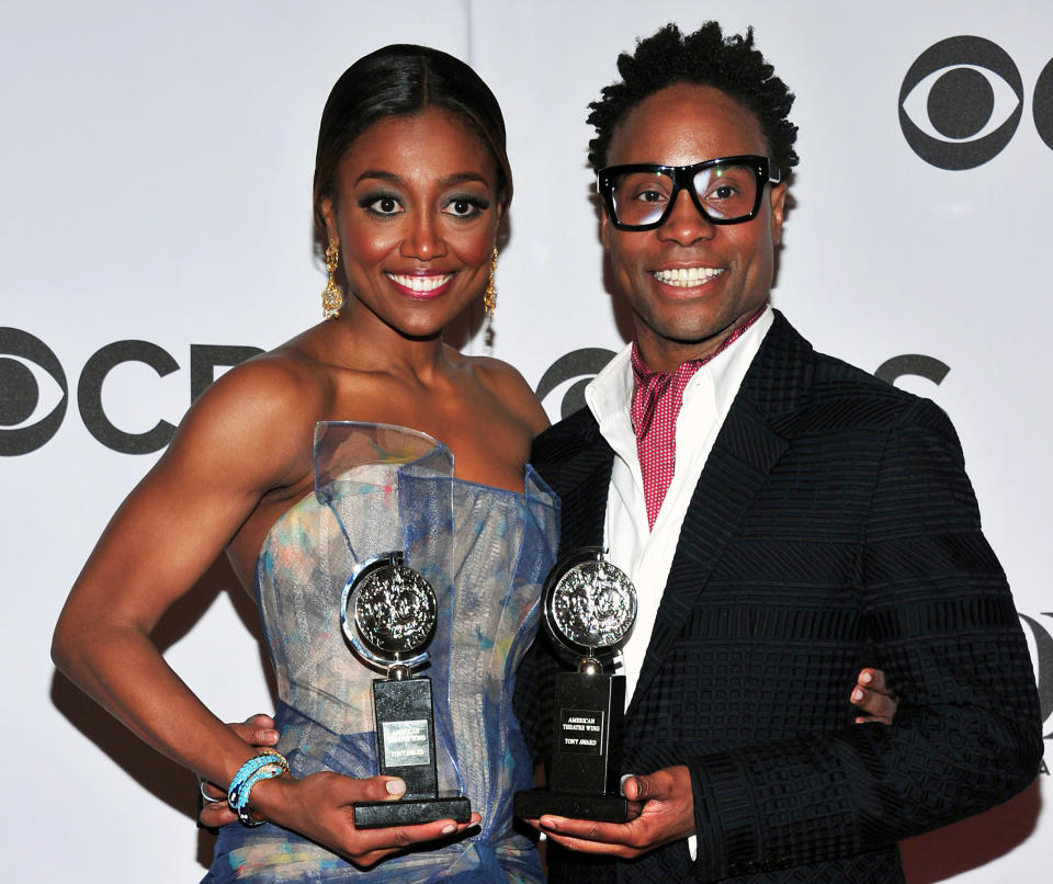 FILE - This June 9, 2013 file photo shows Patina Miller, left, and Billy Porter posing with their awards in the press room at the 67th Annual Tony Awards, in New York. Six alumni from Carnegie Mellon University took home Tonys in five categories, a glittery haul that was both a school record and a huge source of pride for a theater department that turns 100 next year. Billy Porter, Patina Miller and Judith Light each took home acting Tonys, while Ann Roth got one for best costume design, and partners Jules Fisher and Peggy Eisenhauer won for best lighting design of a play. (Photo by Charles Sykes/Invision/AP)