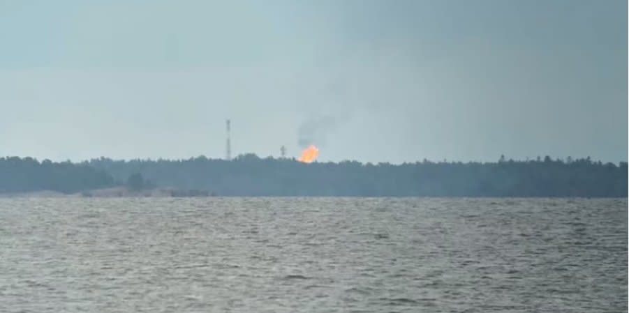 Flames from gas burning on the border between Finland and the Russian Federation