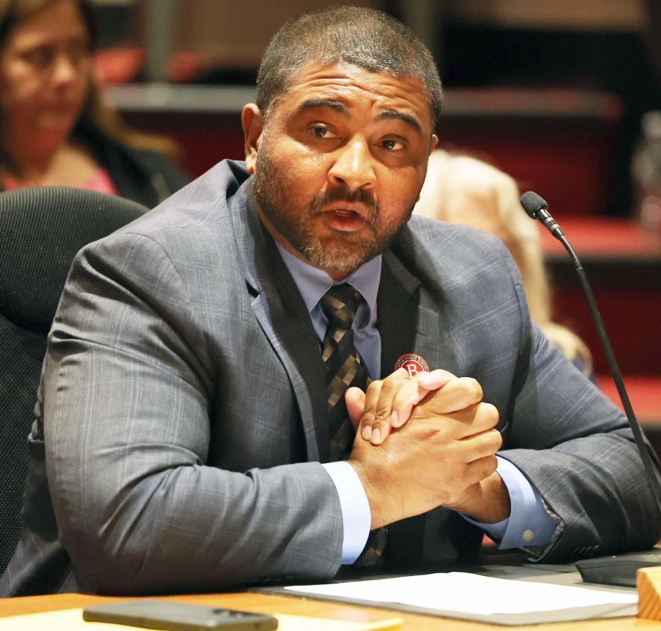 Brockton School Committee member Tony Rodrigues motions to appoint James Cobbs as acting superintendent of schools at an emergency meeting of the school committee at Brockton High School on Friday, Sept. 1, 2023.