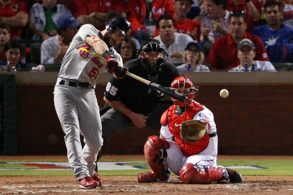 ARLINGTON, TX - OCTOBER 24: Skip Schumaker #55 of the St. Louis Cardinals hits a single to center field in the fifth inning during Game Five of the MLB World Series against the Texas Rangers at Rangers Ballpark in Arlington on October 24, 2011 in Arlington, Texas. (Photo by Doug Pensinger/Getty Images)