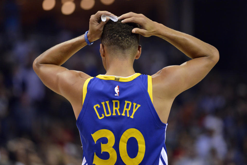 Golden State Warriors guard Stephen Curry reacts during the second half of an NBA basketball game against the Memphis Grizzlies on Saturday, Oct. 21, 2017, in Memphis, Tenn. (AP)