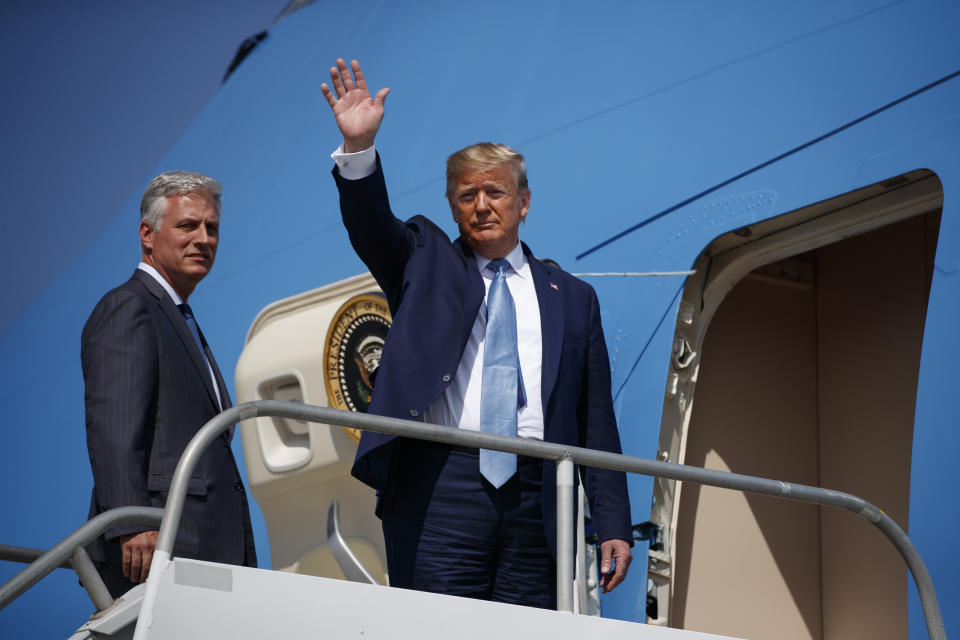 President Donald Trump and new national security adviser Robert O'Brien board Air Force One at Los Angeles International Airport, Wednesday, Sept. 18, 2019, in Los Angeles. (AP Photo/Evan Vucci)
