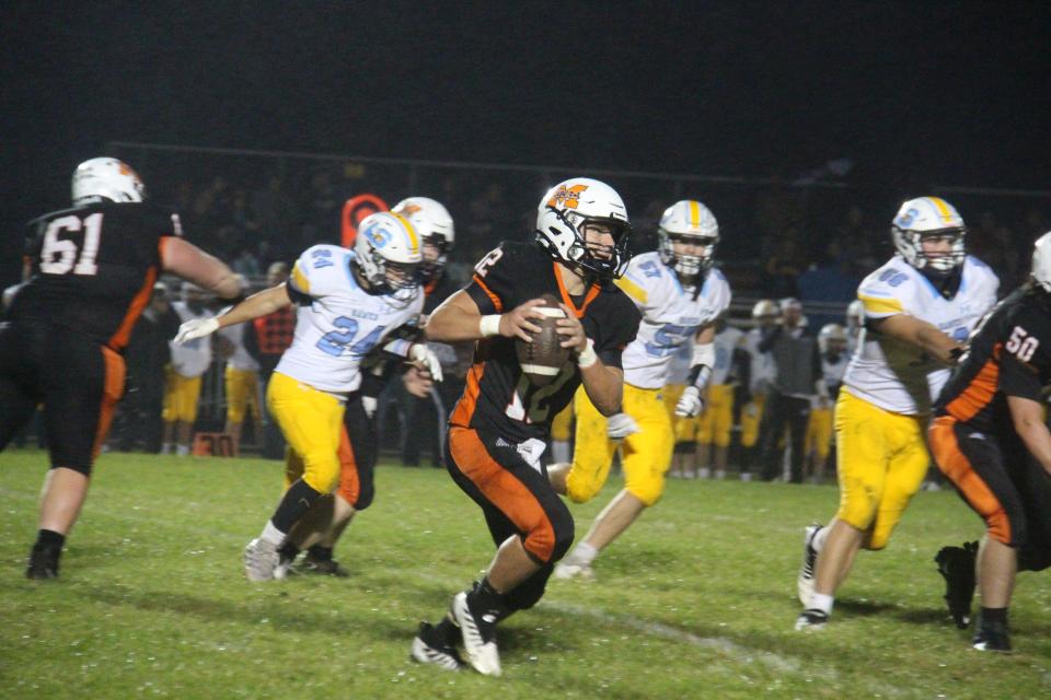 Madrid's Preston Wicker runs the ball during a homecoming game against Lynnville-Sully on Friday, Sept. 23, 2022, in Madrid.