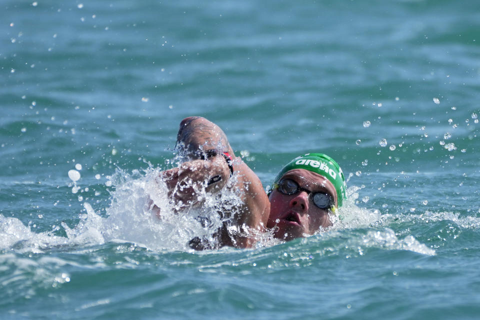 Kristof Rasovszky of Hungary swims to win the men's 10 km open water final at the World Aquatics Championships in Doha, Qatar, Sunday, Feb. 4, 2024. (AP Photo/Hassan Ammar)