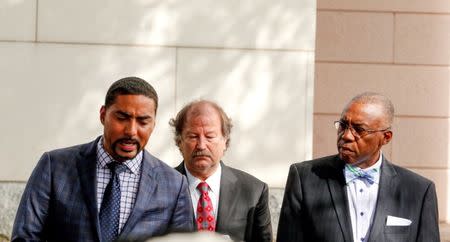 Keith Scott family attorneys (L to R) Justin Bamberg, Charles Monnett and Eduardo Curry give a press conference, held after protests against the police shooting of Scott, in Charlotte, North Carolina, U.S. September 22, 2016. REUTERS/Jason Miczek