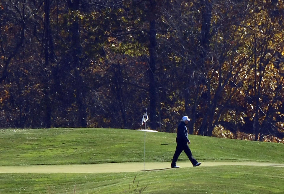 US President Donald Trump walks the golf course at Trump National Golf Club on November 7, 2020 in Sterling, Virginia. - Democrat Joe Biden has won the White House, US media said November 7, defeating Donald Trump and ending a presidency that convulsed American politics, shocked the world and left the United States more divided than at any time in decades. (Photo by Olivier DOULIERY / AFP) (Photo by OLIVIER DOULIERY/AFP via Getty Images)