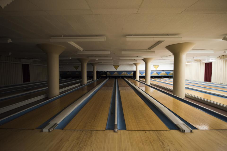 Old bowling lanes sit unused.