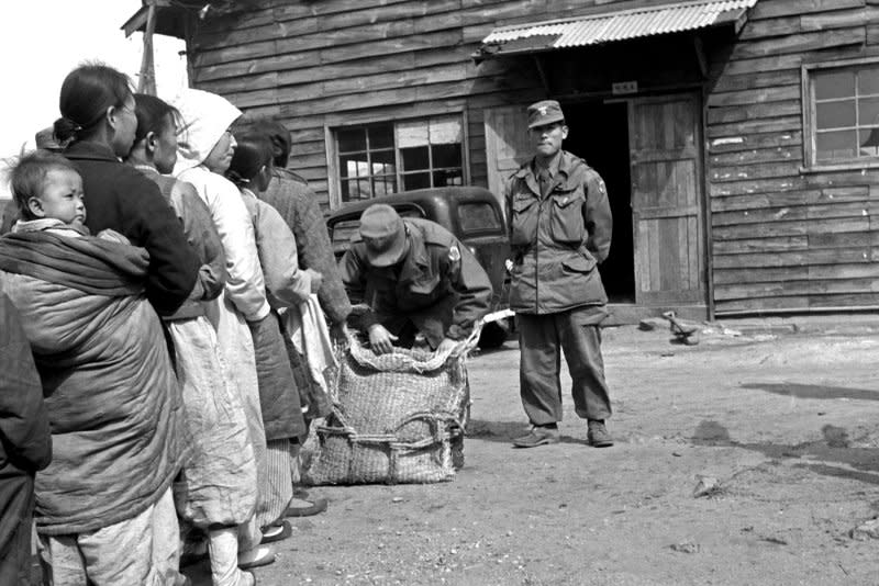 Organized by the United Nations Civil Assistance Command, the distribution of a daily ration of rice to the population of Seoul started three days after the liberation of the city on March 17, 1951. On March 14, 1951, Seoul was recaptured by U.N. troops during the Korean War. File Photo courtesy of the United Nations