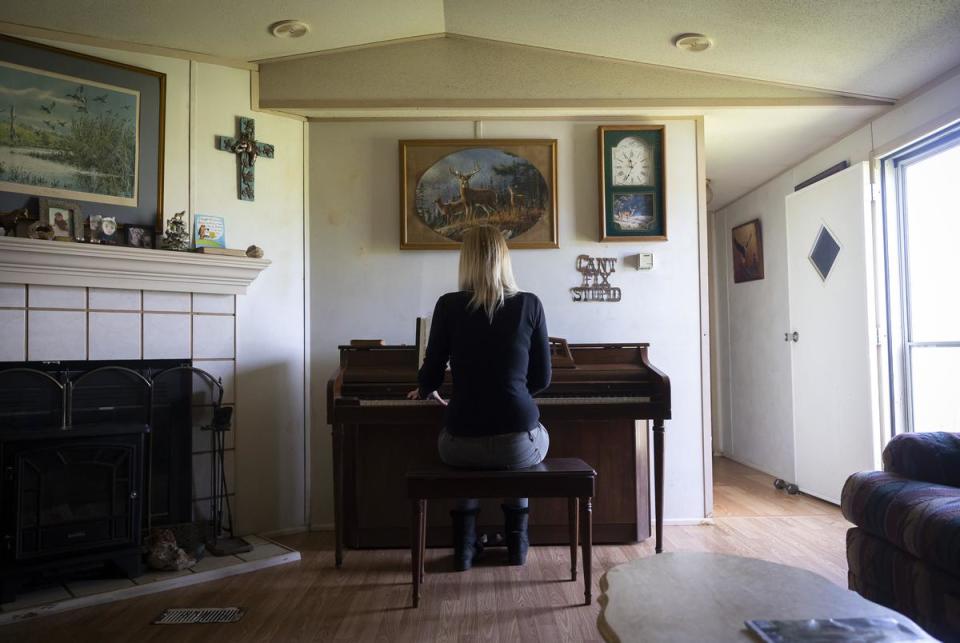Angela Collier in the home she shares with her father on Monday, March 18, 2024, in Midway, TX. Collier has played the piano since she was four years old when her grandmother paid for her to begin lessons.