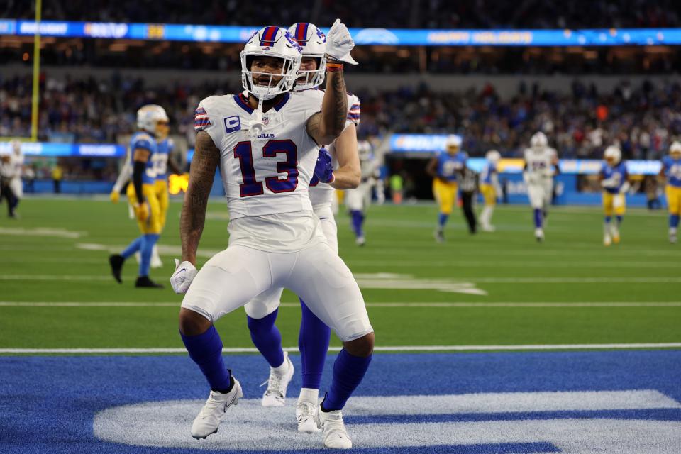 Dec 23, 2023; Inglewood, California, USA; Buffalo Bills wide receiver Gabe Davis (13) celebrates after scoring a 57-yard touchdown during the second quarter against the Los Angeles Chargers at SoFi Stadium. Mandatory Credit: Kiyoshi Mio-USA TODAY Sports