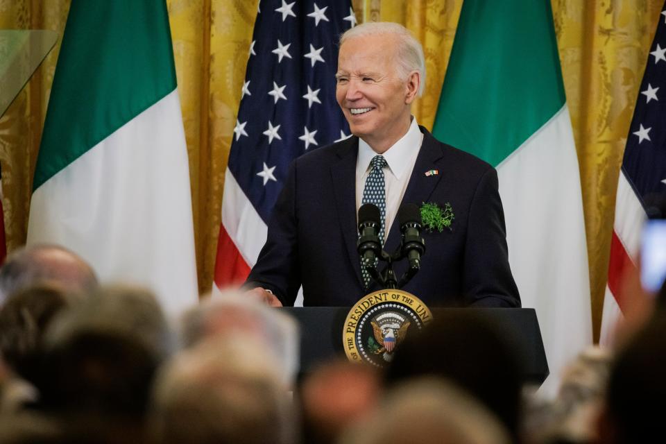 President Joe Biden speaks during a Saint Patrick's Day event on Sunday. Biden and congressional leaders announced they reached a government funding deal on Tuesday.