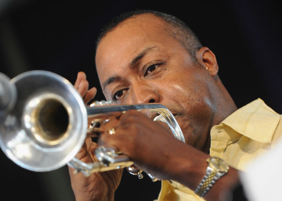 NEW ORLEANS, LA - APRIL 28: Jamil Sharif joins Irvin Mayfield on stage during the 2012 New Orleans Jazz & Heritage Festival Day 2 at the Fair Grounds Race Course on April 28, 2012 in New Orleans, Louisiana. (Photo by Rick Diamond/Getty Images)