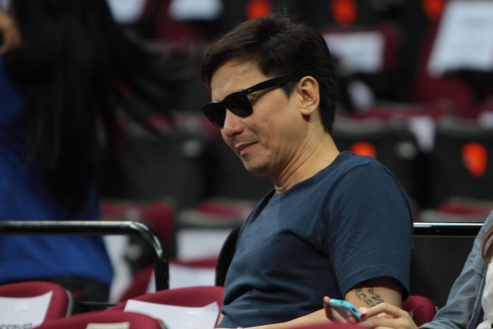 Rommel Padilla, Daniel Padilla's father watches Princess and I "The Royal Championship" basketball game between Team Jao and Team Gino held at the Mall of Asia Arena in Pasay city, south of Manila on 20 January 2012.