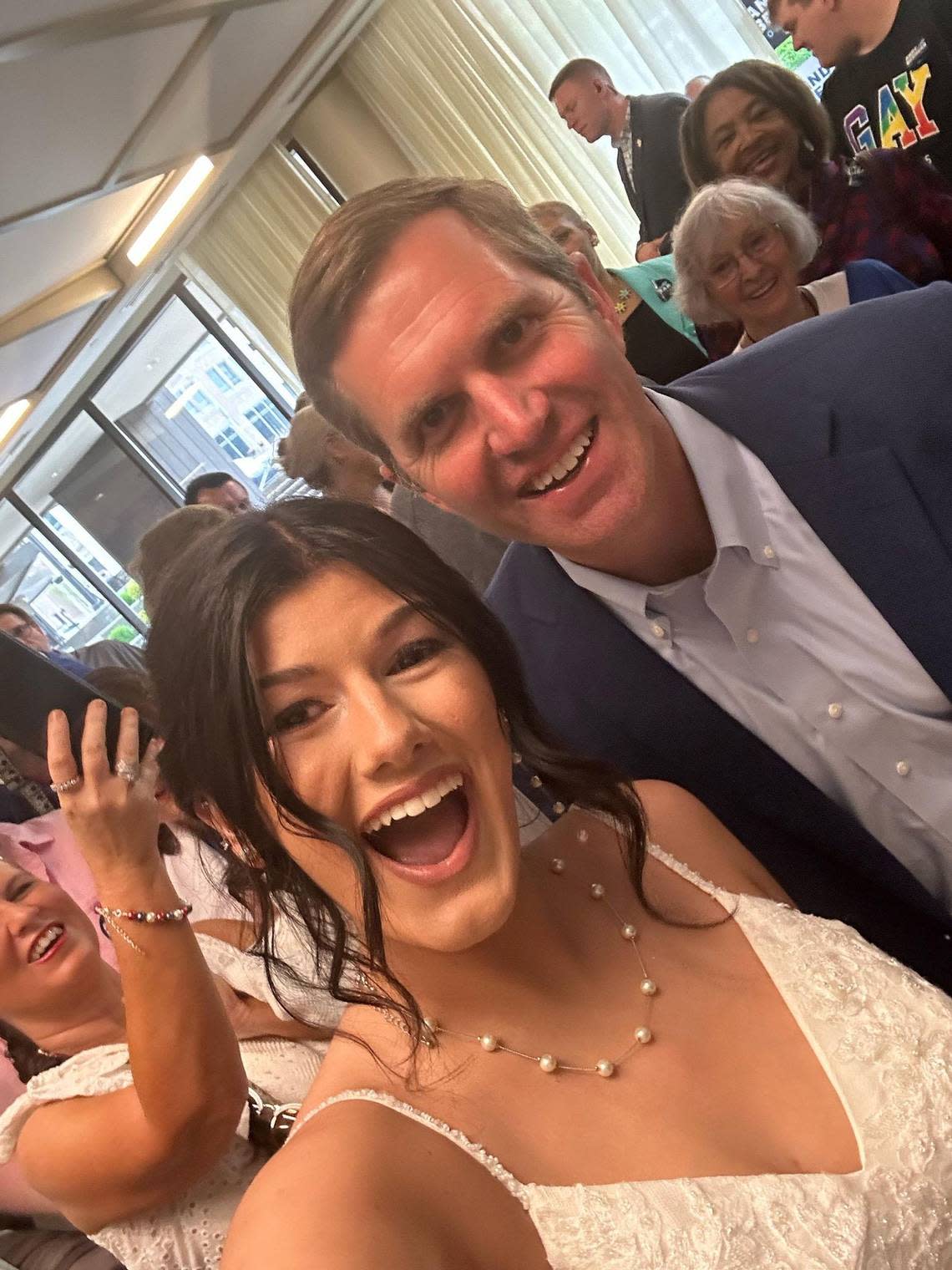 Delaney Blackwell took a selfie with Andy Beshear at an Ashland hotel shortly before her wedding.