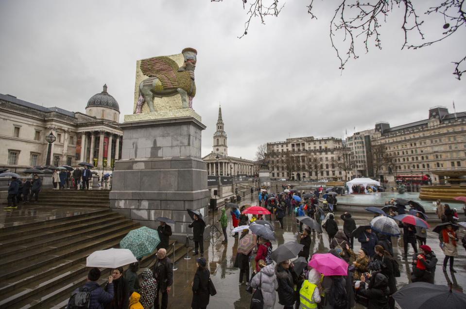 People looking at the installation during the unveiling of the new commission for Trafalgar Square's fourth plinth, Rakowitz's 'The Invisible Enemy Should Not Exist'.